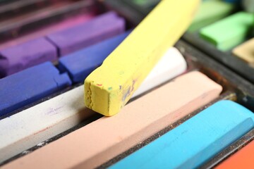 Set of colorful chalk pastels as background, closeup