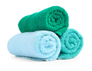 Colorful rolled terry towels isolated on white