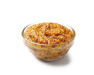 Whole grain mustard in glass bowl isolated on white