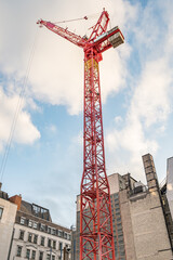 Very tall red construction crane.
This huge crane is helping with the construction of a new...