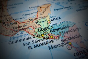 Map of Guatemala with round vignette. Selective focus on label, close-up view © Halina