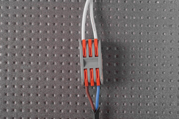 A terminal for connecting electrical wires.