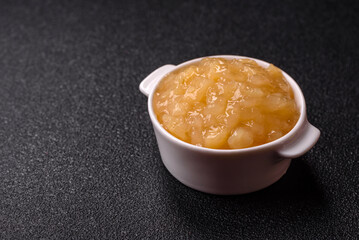 Apple sweet sauce, baby food, canned ingredient for desserts. Apple sauce