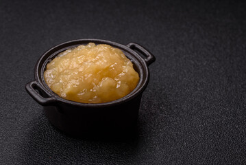 Apple sweet sauce, baby food, canned ingredient for desserts. Apple sauce