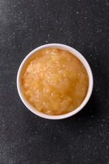 Apple sweet sauce, baby food, canned ingredient for desserts. Apple sauce