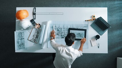 Time lapse of smart engineer hold project plan and place on meeting table with equipment, safety...