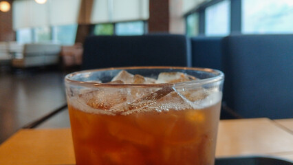 A cup of iced coffee on a table