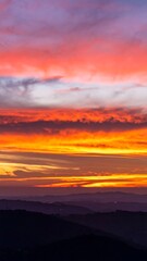 Vibrant sunset over mountain ranges