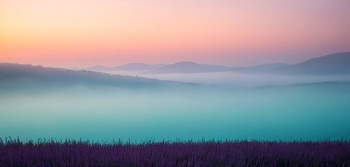 Serene lavender field at dawn with misty mountains and soft pastel sky