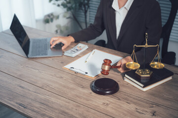 Judge gavel with Justice lawyers, Businessman in suit or lawyer working on a documents. Legal law, advice and justice concept.