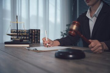 Judge gavel with Justice lawyers, Businessman in suit or lawyer working on a documents. Legal law, advice and justice concept.