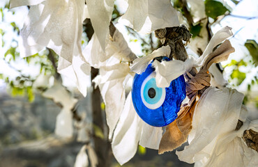 Tree branches decorated with the traditional Turkish eye-shaped amulets – Nazars.
The evil eye...