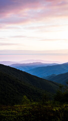 Sunset In The Mountains With Silhouettes Of Peaks In The Rays Of The Setting Sun, Scenic Mountain Landscape In Yellow Red And Pink Hues, Evening Nature Background