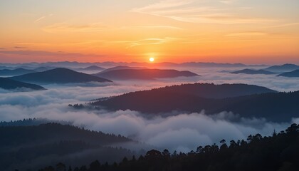 Obraz premium Sunrise over misty mountain range.