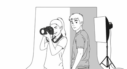 Photographer at work, capturing model in photo studio with backdrop and softbox. Photographer in action is fully engaged to take perfect photo of his handsome male model in photo studio.