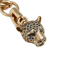 Fototapeta premium Closeup of a detailed golden leopard head pendant with a thick chain, isolated on transparent background