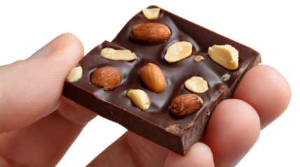 Indulge in Decadence A Hand Holds a Square of Dark Chocolate Adorned with Almonds Against a Transparent Backdrop