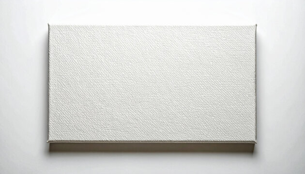 Blank canvas awaiting artistic creation on white surface