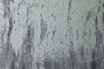 Worn and stained gray metal surface

