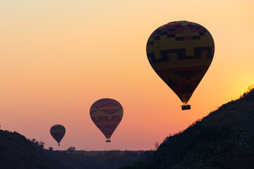 3 Hot Air Balloons Silhouette at Sunrise