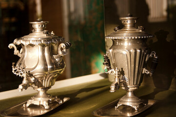 Antique samovar on a table, shallow depth of field
