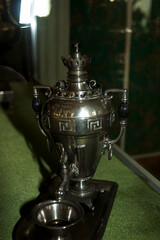 Old samovar in the interior of the hotel. Russia.