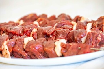 Typical Brazilian barbecue skewer made with filet mignon, a traditional happy hour snack. Espetinho, churrasquinho