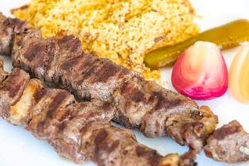 Typical Brazilian barbecue skewer made with filet mignon, a traditional happy hour snack. Espetinho, churrasquinho