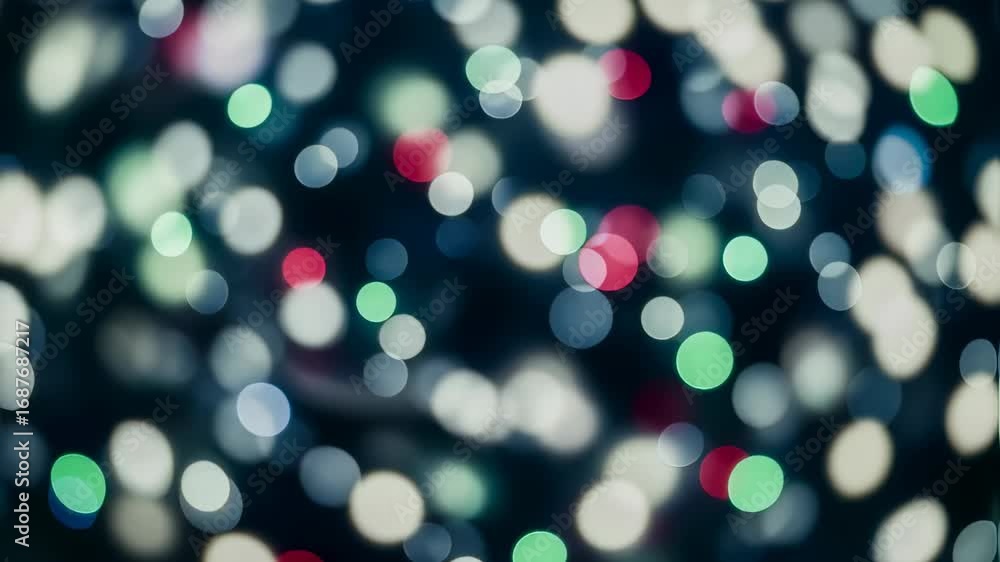 Poster Blurry colorful lights creating abstract bokeh effect. Festive Christmas background with warm glowing circles illumination footage.