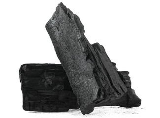 Large pieces of wooden black charcoal isolated on a white background. Hard wood charcoal. Traditional charcoal.