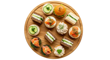 Assortment of elegant finger sandwiches and canapés arranged in a circular pattern on a wooden board, perfect for parties and events