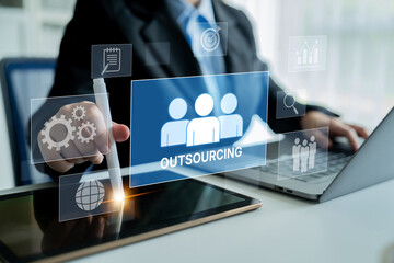 Outsourcing concept showing collaboration, delegation, global workforce, productivity, and task management through remote teams and external service providers Latch