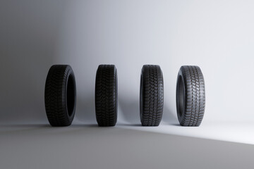Four tires of a car wheel on a white background. Replacing new winter tires. Safety and control, concept