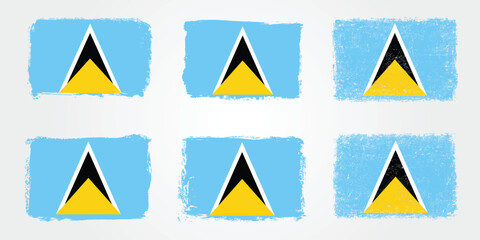 Grunge style Saint Lucia flags with triangular design and brush stroke textures