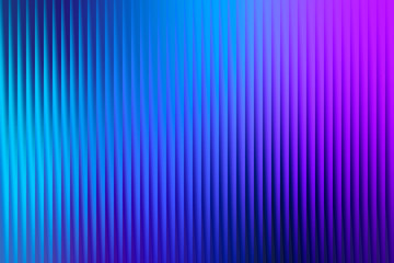 Abstract background with vertical ribbed texture in shades of bright blue and vibrant purple, creating a gradient