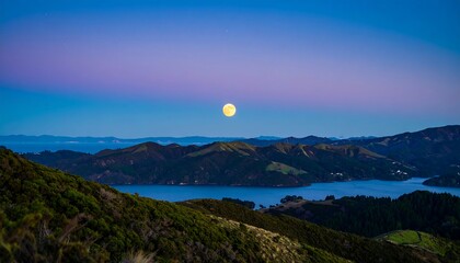 Full moon over a tranquil bay