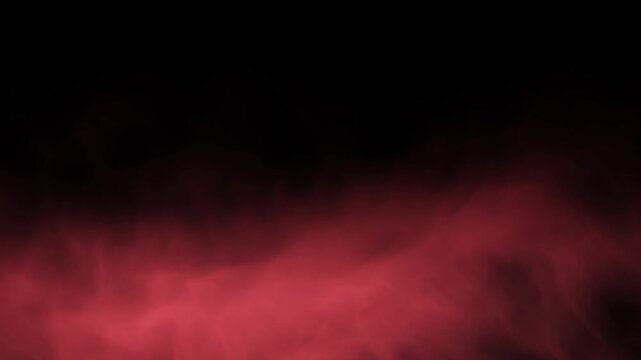 Thick red smoke on a black background. Red mist fog. Smoke and fire.