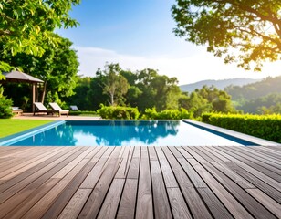 Outdoor pool with wooden deck and lush greenery