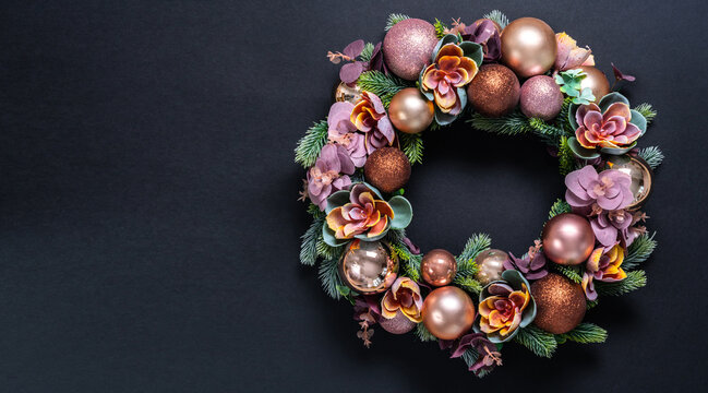 Beautiful Christmas wreath decoration on black background. flat lay with copy space - Powered by Adobe