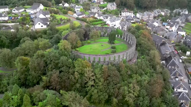 4k drone footage of McCaigs Tower overlooking Oban in Argyll and Bute, Scotland