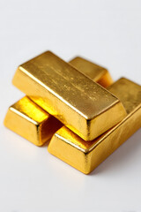 Stack of shiny gold bars isolated on a clean white background.