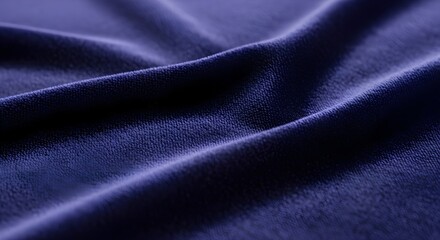 Obraz premium Luxurious deep blue velvet fabric texture with elegant folds and soft lighting