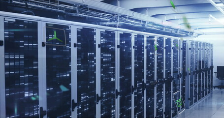 Operating servers housed in cabinets lining data center aisle, with blinking LED indicators