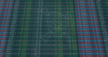 Displaying digital financial data table filling screen at trading desk, with overlaid trend graph