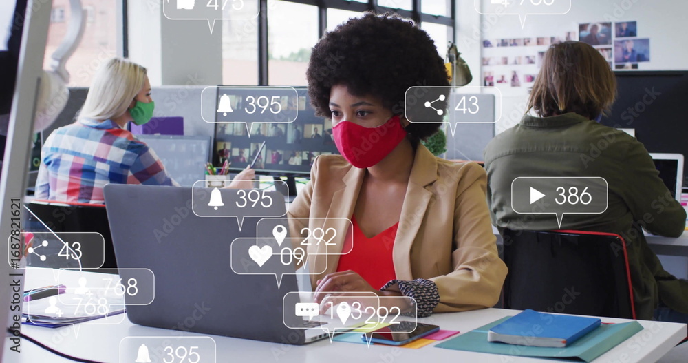 Poster collaborating masked colleagues sharing open office using laptops, with floating notification icons