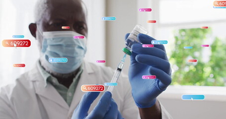 Drawing liquid from vaccine vial Dr