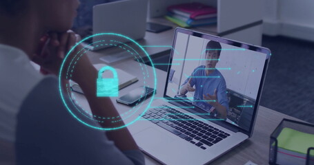 Showing man listening at office desk while laptop displaying padlock over secure call, copy space
