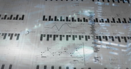Projecting semi-transparent grid over blurred backdrop, showing bar charts, line graphs, sparklines