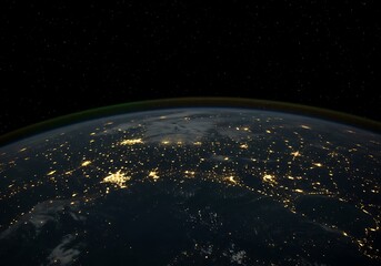 Earth's surface illuminated by city lights as seen from space at night