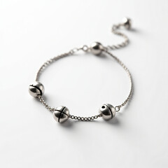 Charming, silver ankle bracelet with small bells isolated